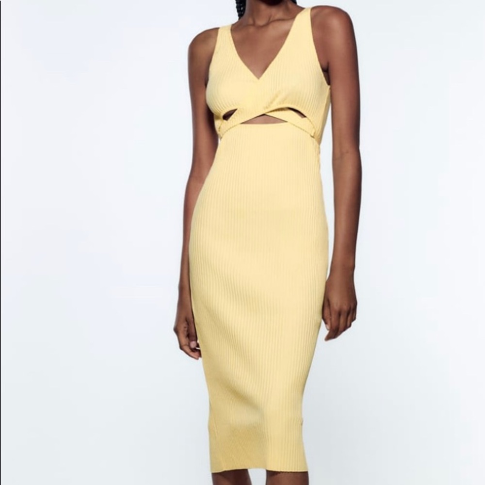 Yellow Midi cut out dress. Size XS but is stretchy to fit a size small.